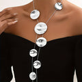 Necklace with textured disc, handmade multi-layered pendant chain, women's jewelry, anti-rust and hypoallergenic designer accessory for daily use during parties.