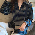 Camicia da studentessa di nicchia a maniche lunghe con design a righe in stile occi