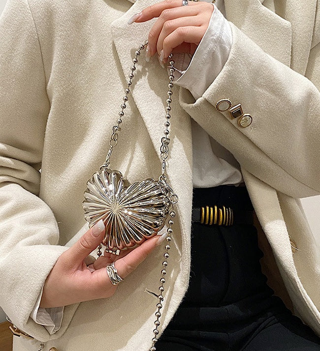 Borsa a mano a forma di cuore in ferro battuto alla moda, con personalità metallica