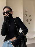Maglione pullover a collo alto da donna in maglia sottile